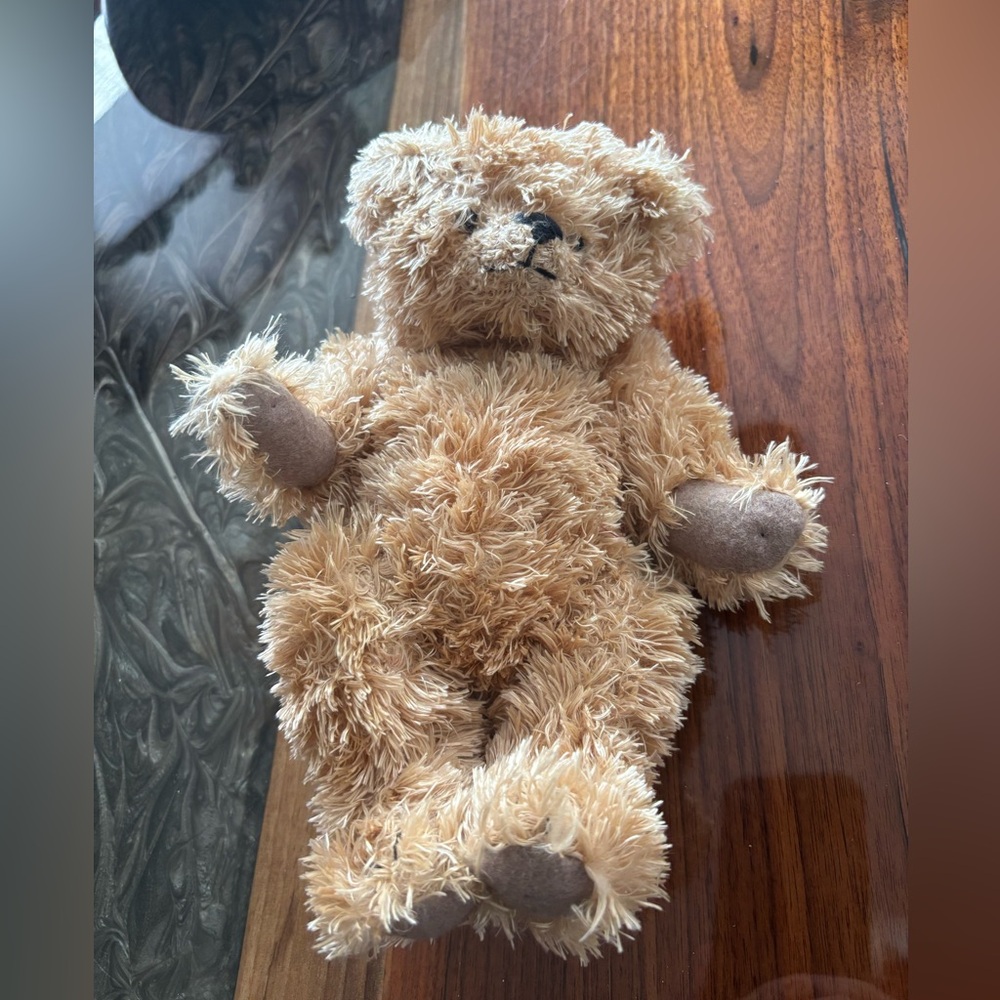 Tan teddy bear jointed  approx 9 “ tall.